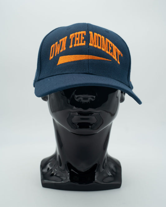 Own The Moment Navy/Orange Caps